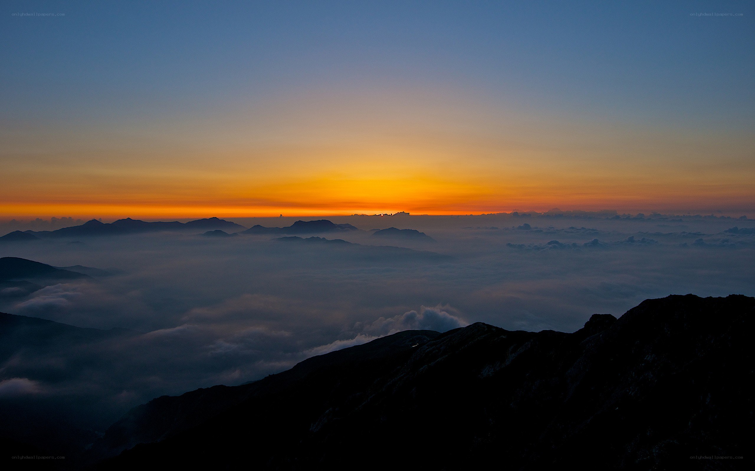 Sunrise over mountain peaks