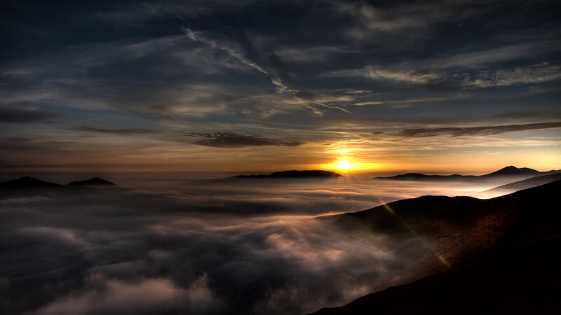 Sunrise over Mountain Peaks — Orange