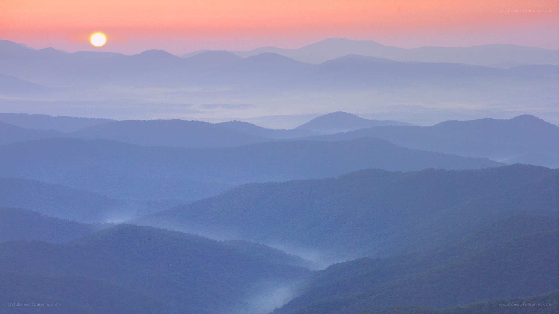 Sunrise over mountain ranges