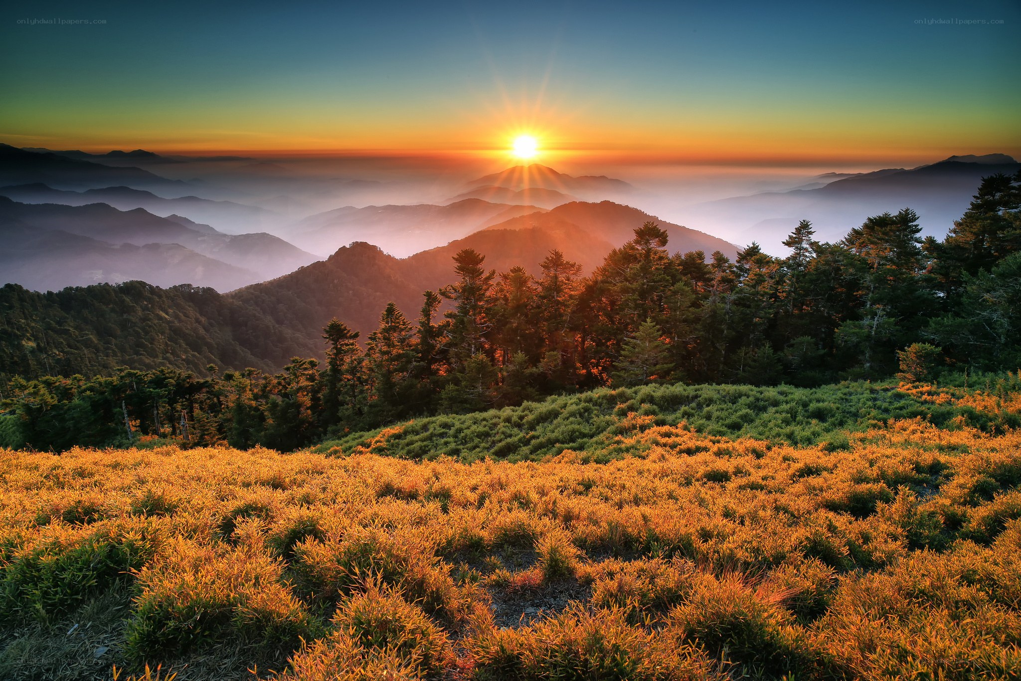 Sunrise over mountain ridges