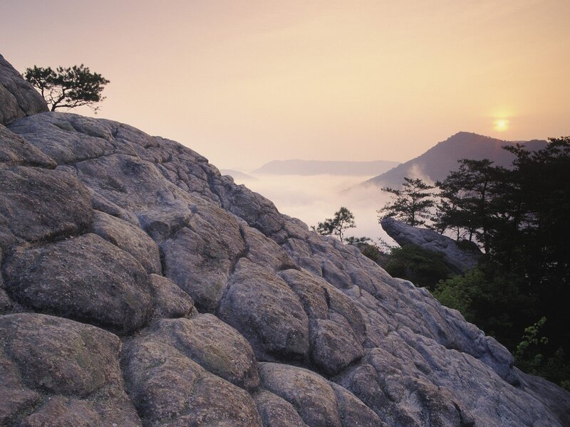 Sunrise over mountain rocks