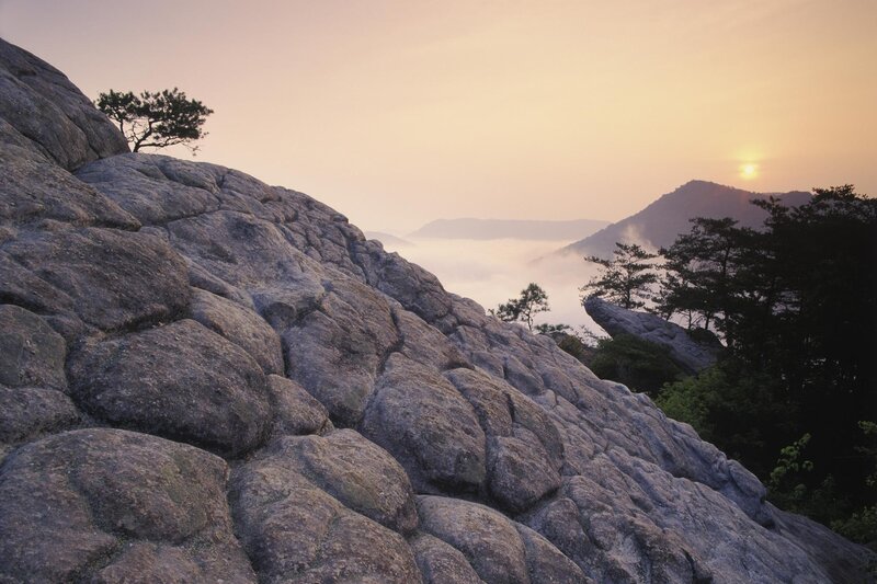 Sunrise over mountain rocks