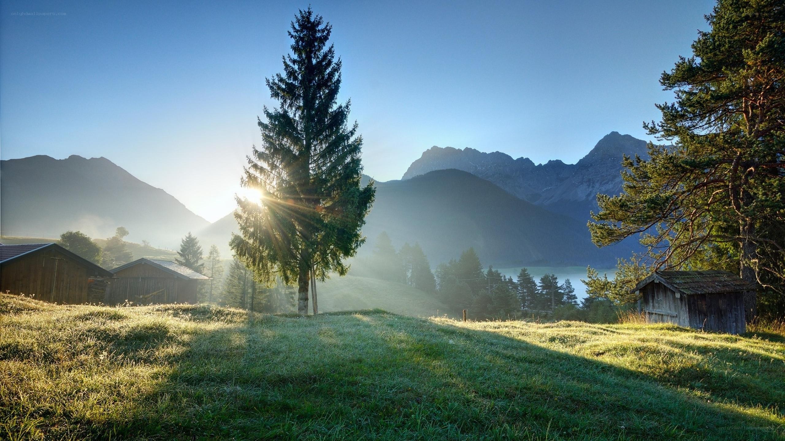 Sunrise over mountain valley