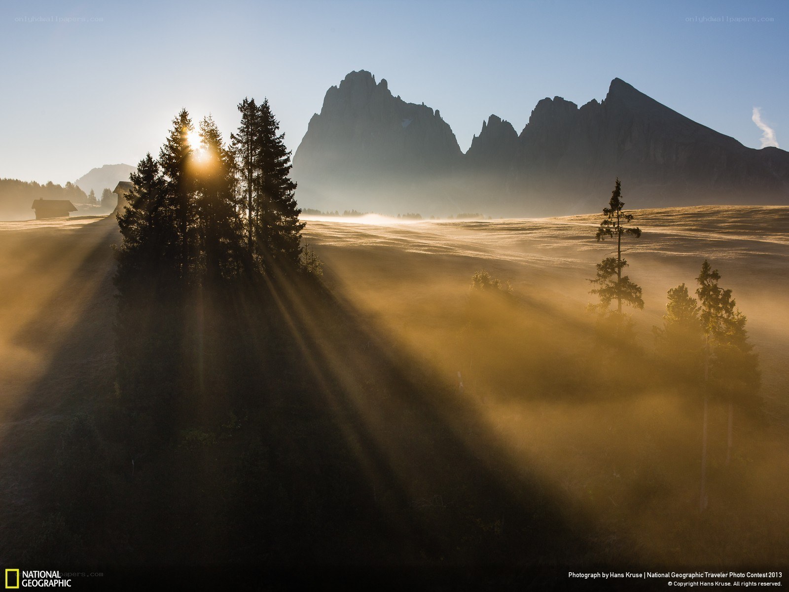 Sunrise over mountain valley