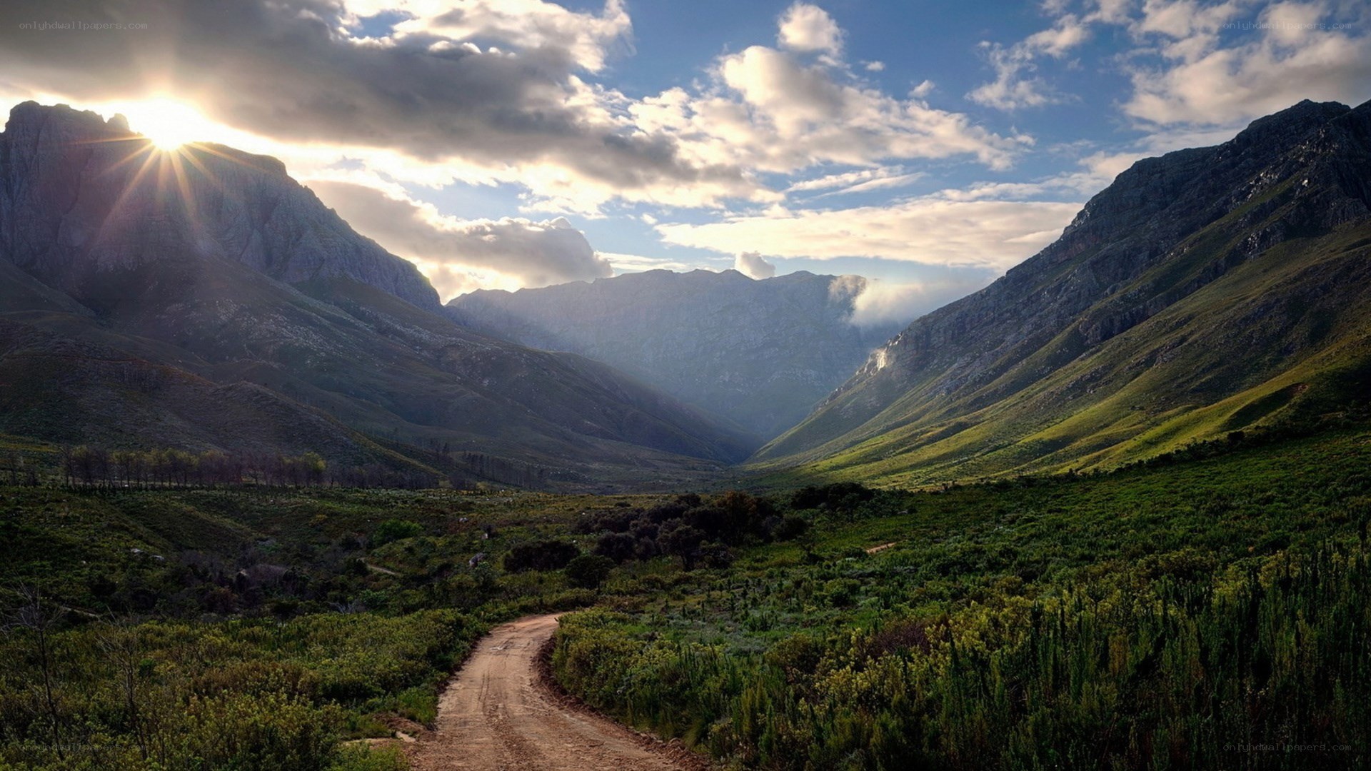 Sunrise over mountain valley