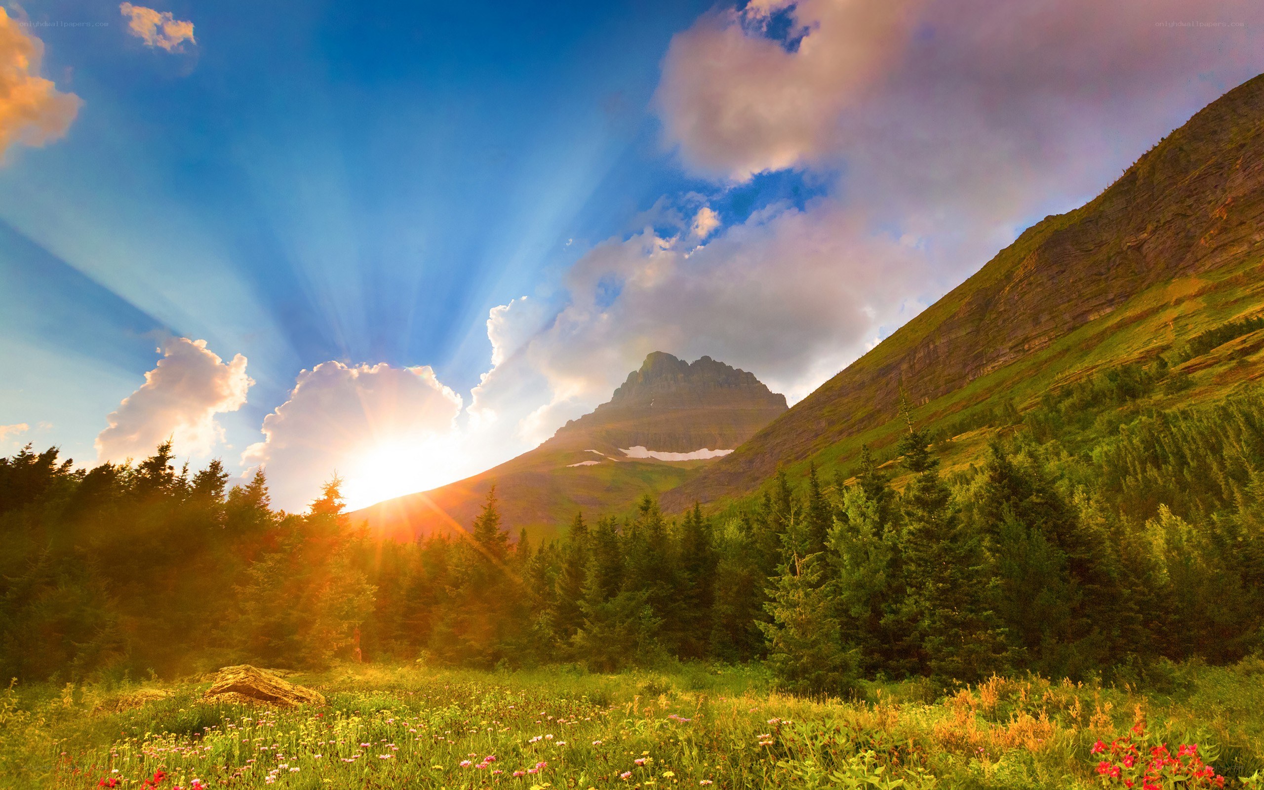 Sunrise over mountain valley