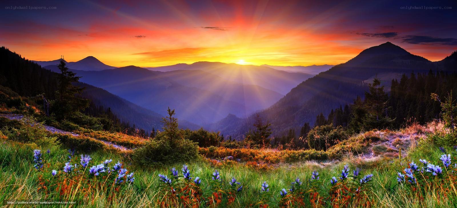 Sunrise over mountain valley