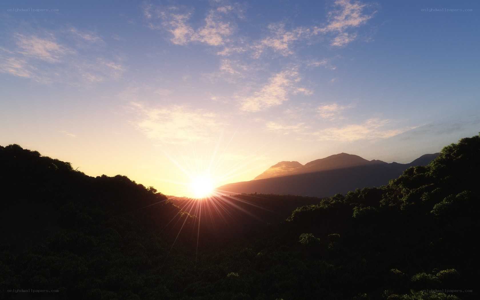 Sunrise over mountain valley