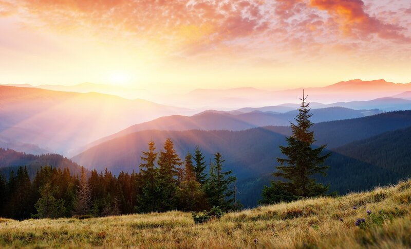Sunrise over mountain valleys