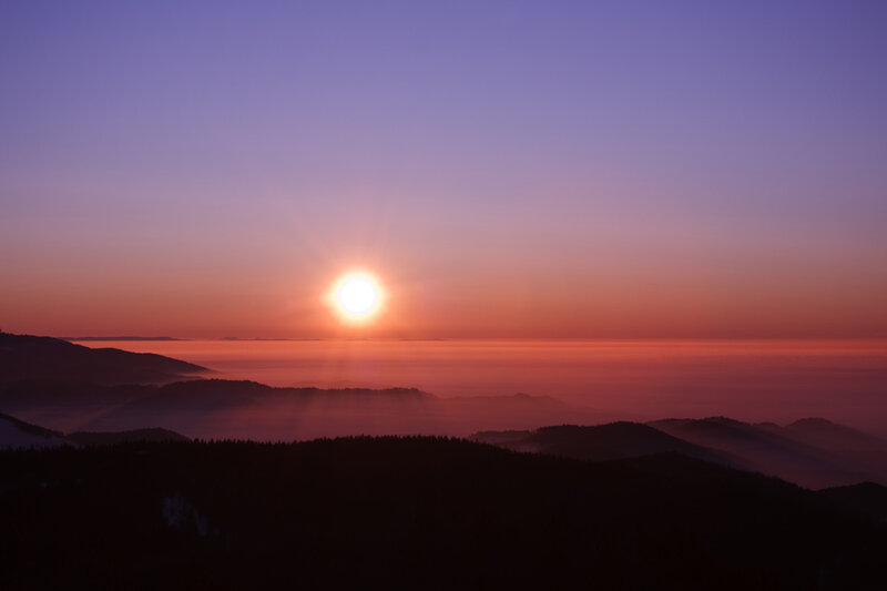 Sunrise over mountain valleys