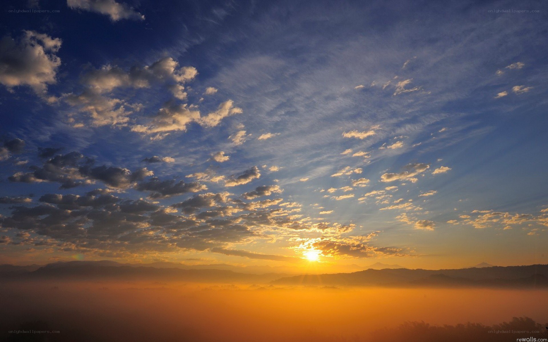 Sunrise over mountainous landscape