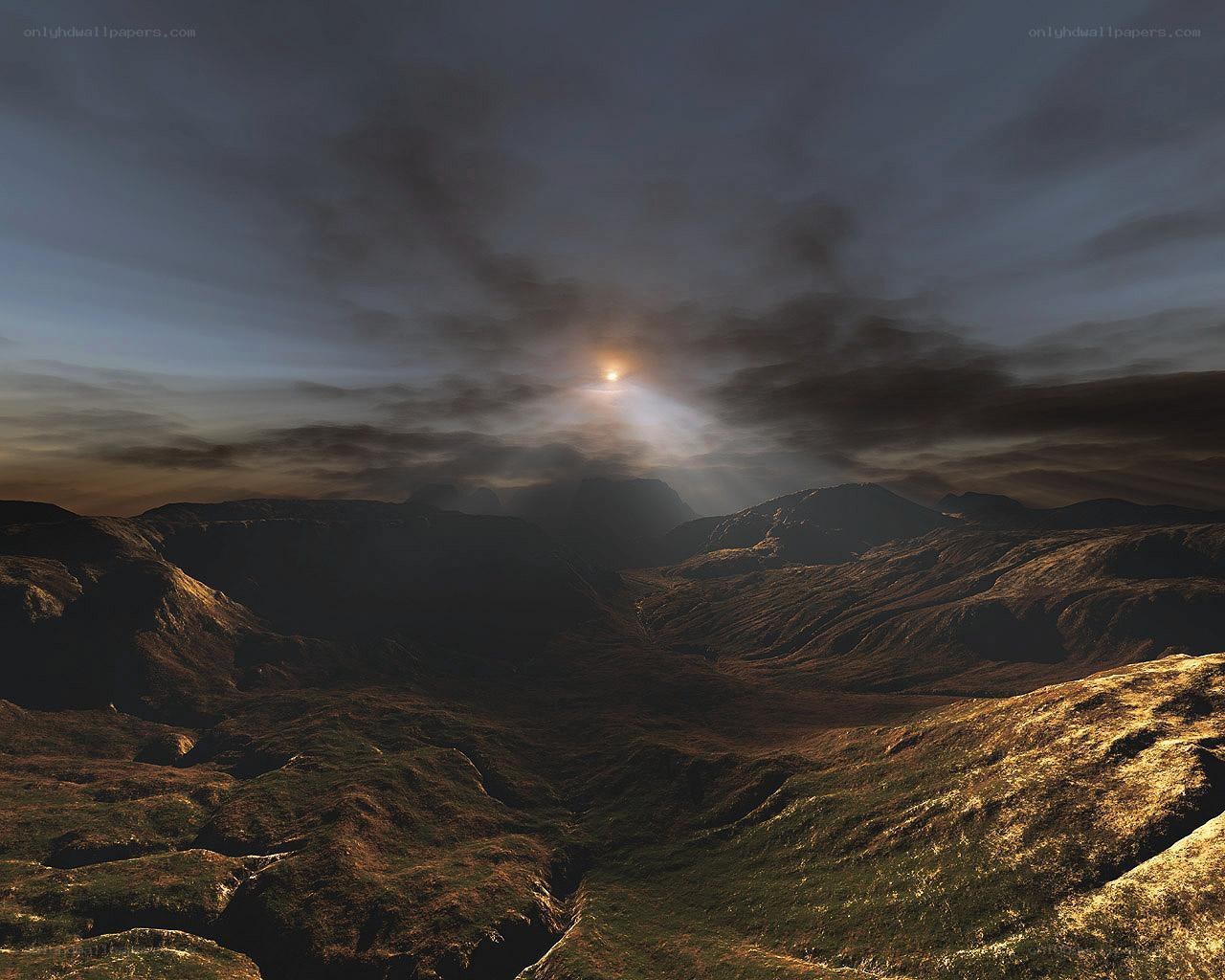 Sunrise over mountainous terrain