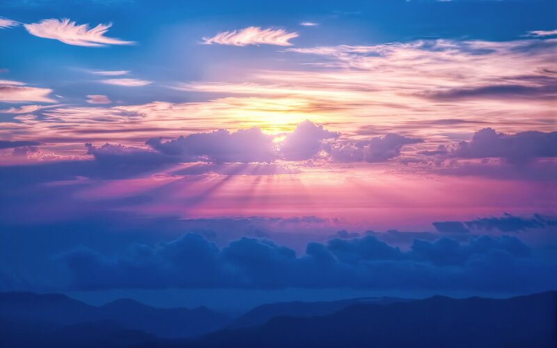 Sunrise over Mountains — Blue, Serene, Photograph, Clouds, Sunbeams