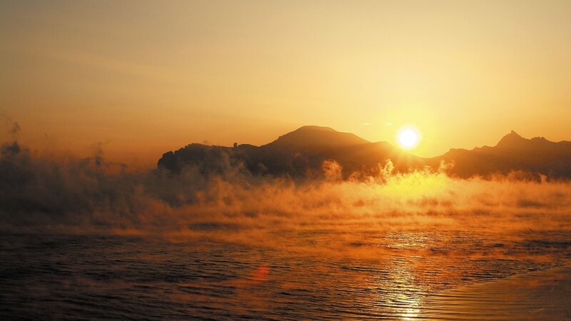 Sunrise over Mountains — Orange, Serene, Photograph, Fog, Water