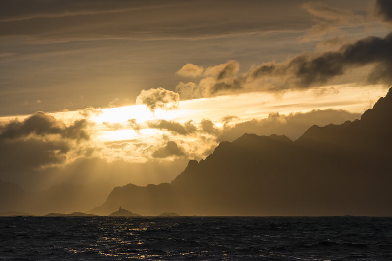 Sunrise over Ocean and Mountains