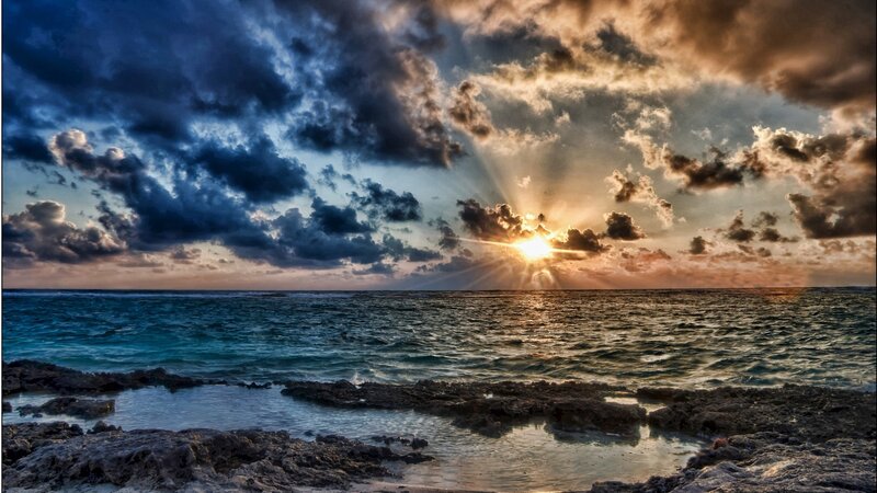 Sunrise over Ocean — Blue, Dramatic, Photograph, Clouds, Rocks