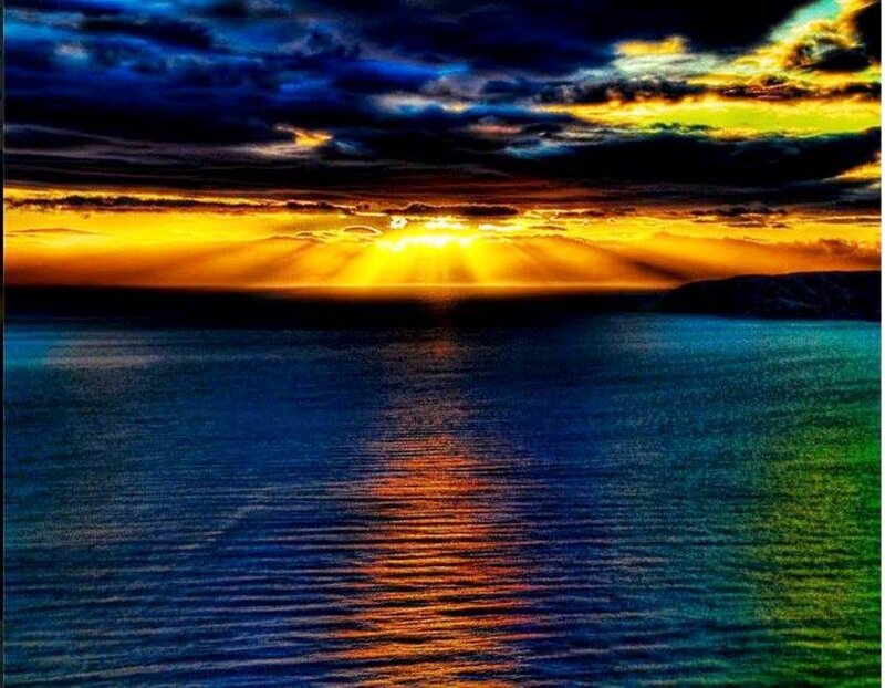 Sunrise over Ocean — Blue, Dramatic, Photograph, Clouds, Sea, Rays