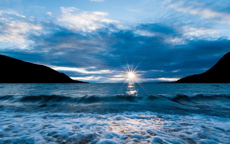 Sunrise over Ocean — Blue, Dramatic, Photograph, Mountains, Waves