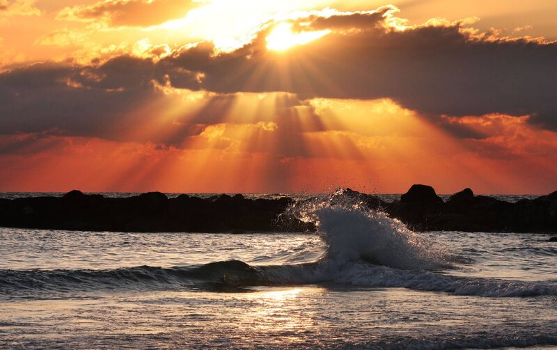Sunrise over Ocean Waves