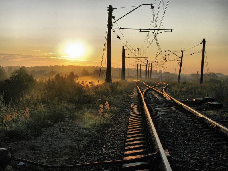 Sunrise over railway tracks