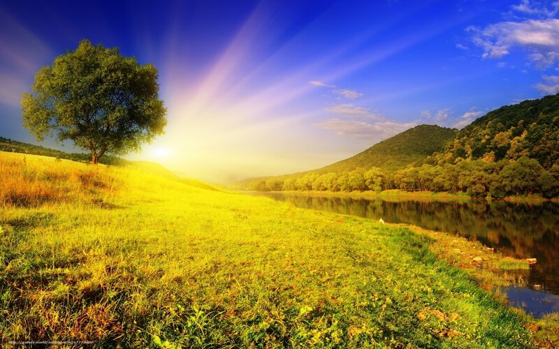 Sunrise over river landscape