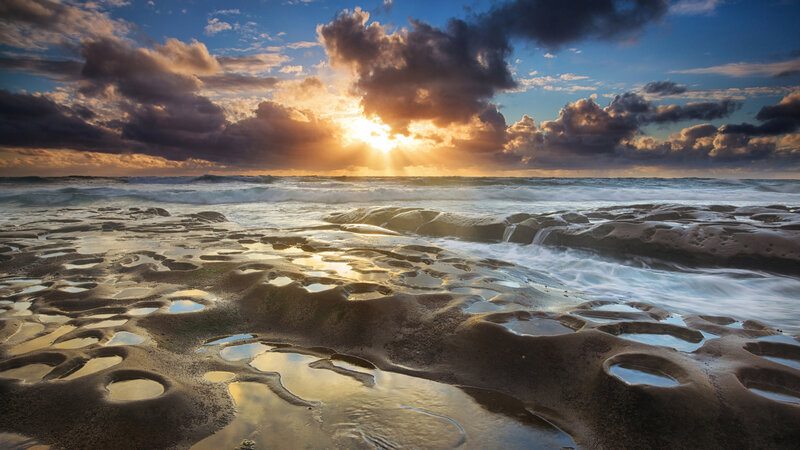 Sunrise over Rocky Beach — Blue