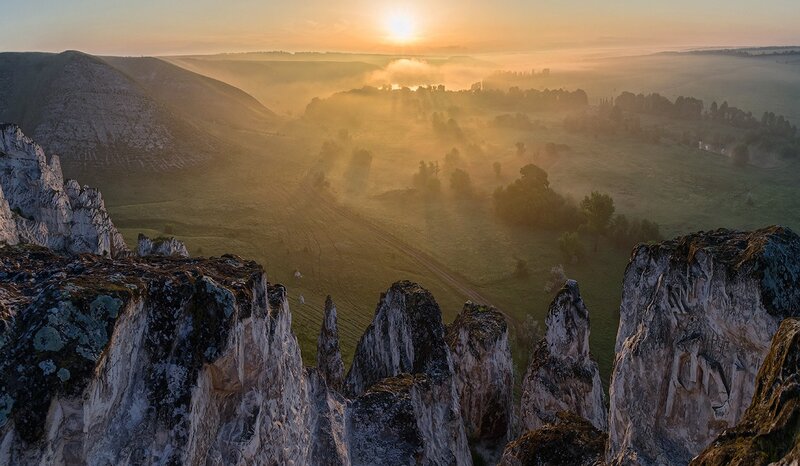 Sunrise over rocky cliffs