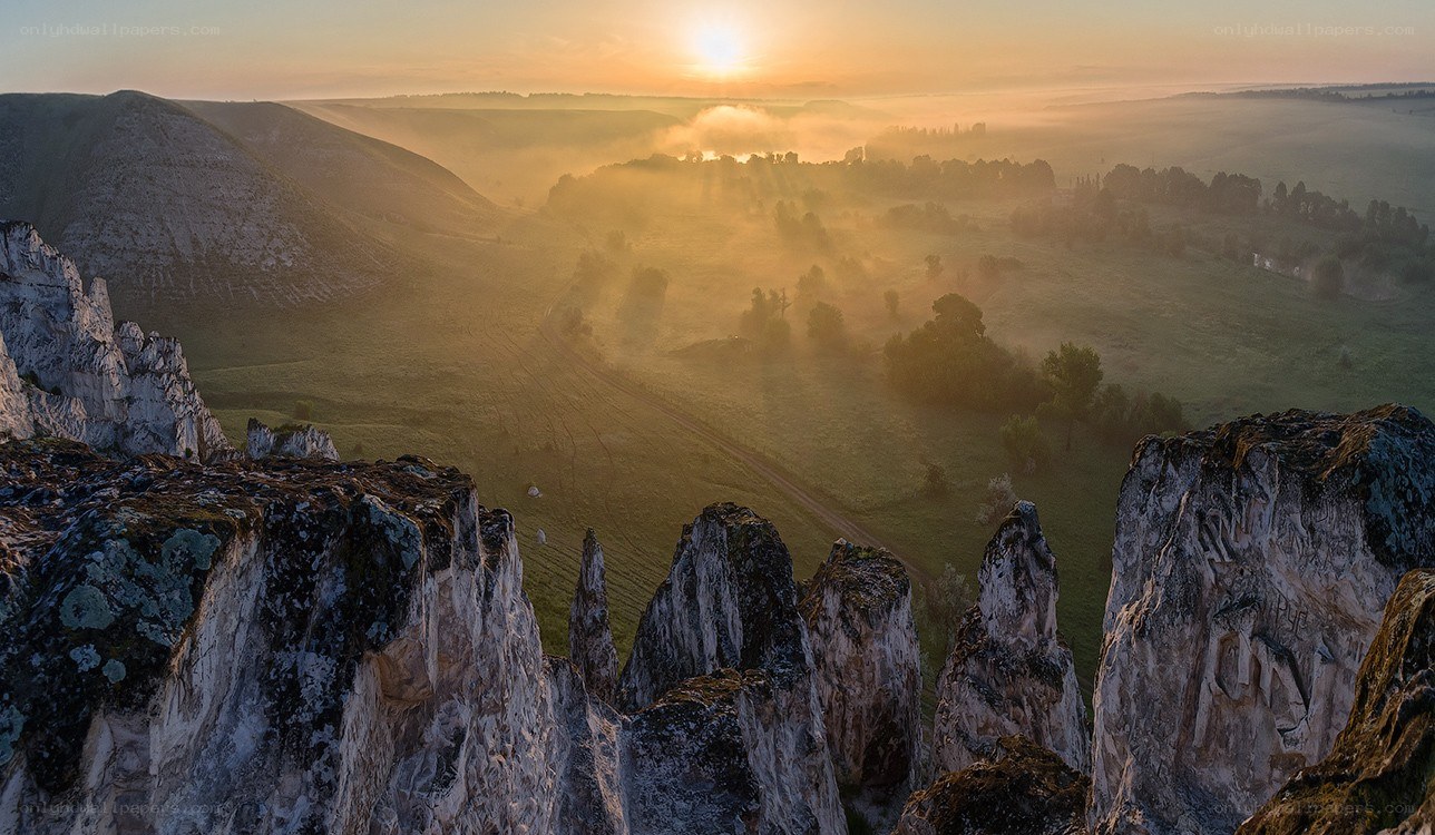 Sunrise over rocky cliffs