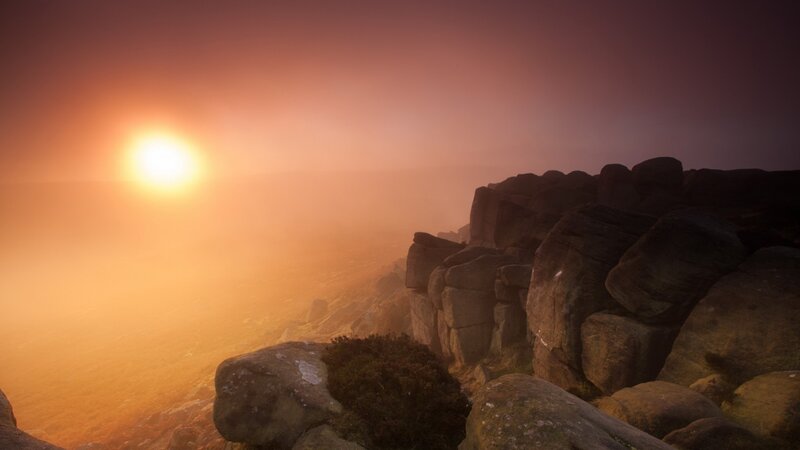 Sunrise over Rocky Cliffs — Orange