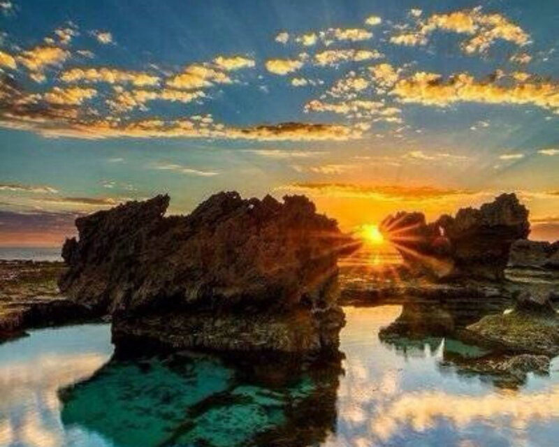 Sunrise over Rocky Shore — Blue, Dramatic, Photograph, Rocks
