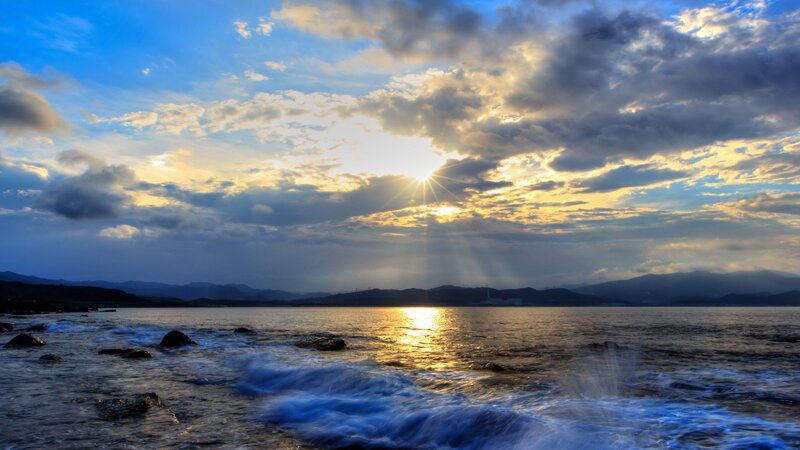 Sunrise over Rocky Shore — Blue, Dramatic, Photograph, Sea