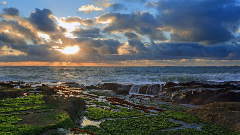 Sunrise over Rocky Shore — Blue, Dramatic, Photograph
