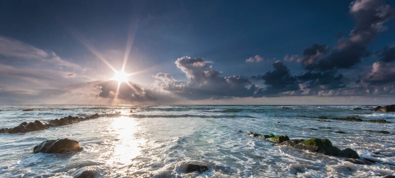 Sunrise over Rocky Shore — Blue, Dramatic
