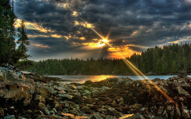 Sunrise over Rocky Shore — Orange, Dramatic, Photograph, Trees, Water, Rocks, Clouds