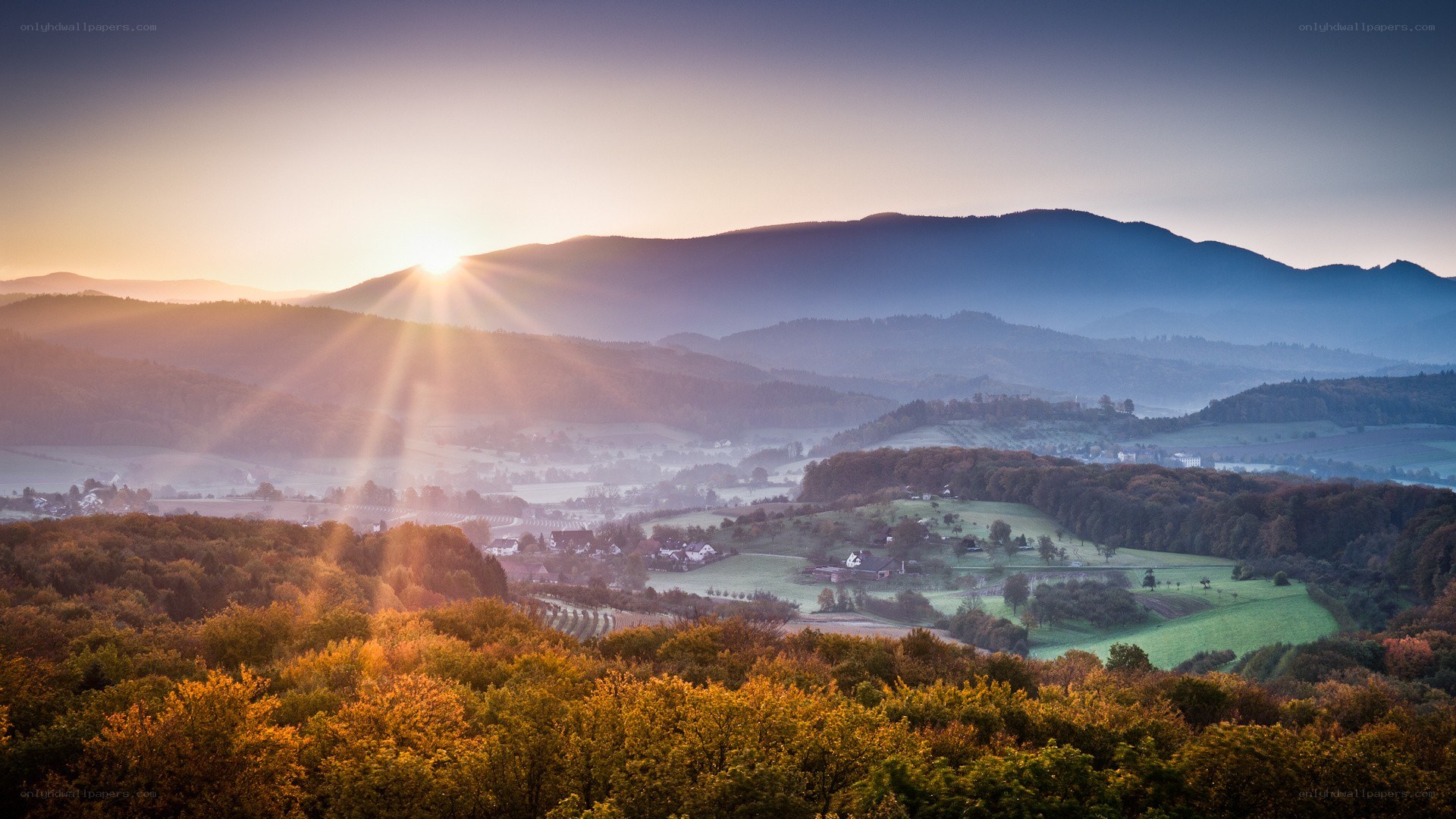 Sunrise over rolling hills