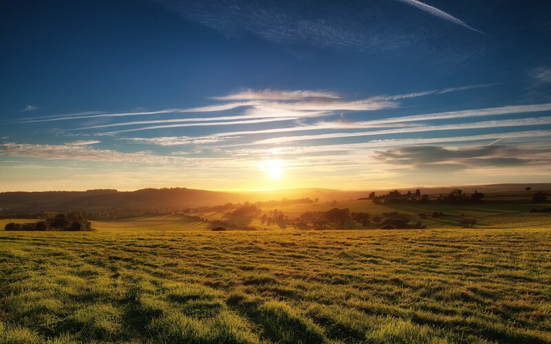 Sunrise over Rolling Hills — Blue, Serene, Photograph, Sun, Clouds
