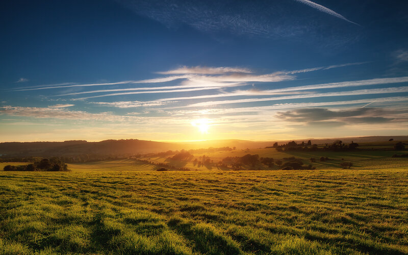 Sunrise over Rolling Hills — Blue, Serene