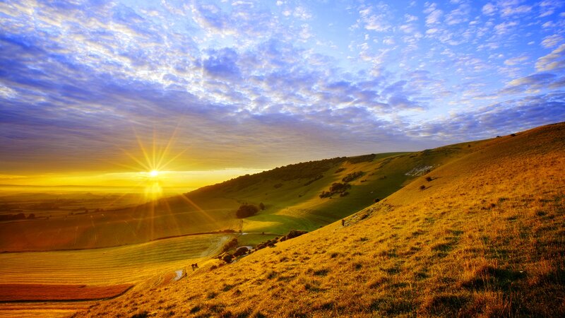 Sunrise over Rolling Hills — Blue