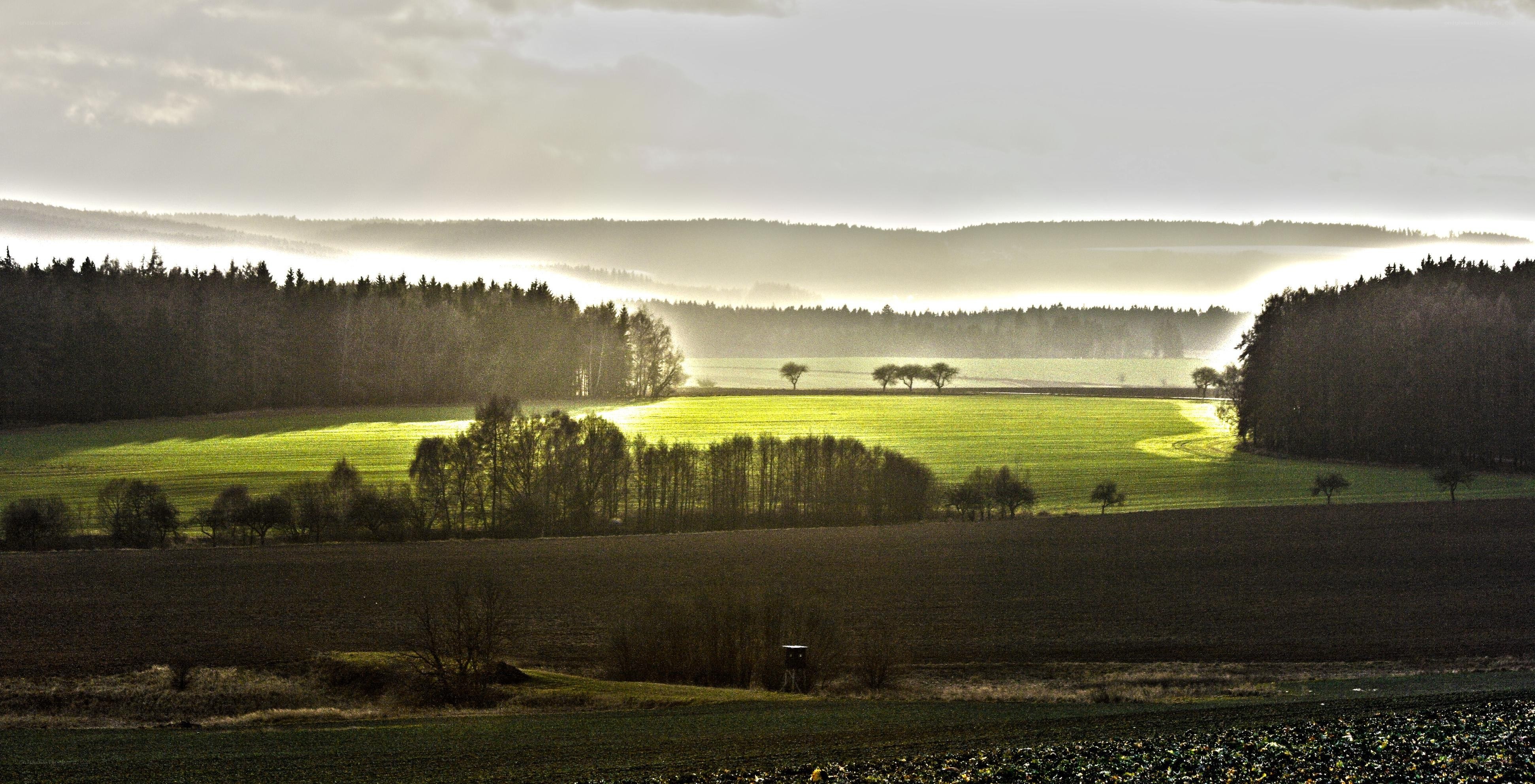 Sunrise over rural landscape