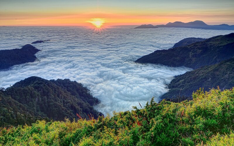 Sunrise over sea of clouds