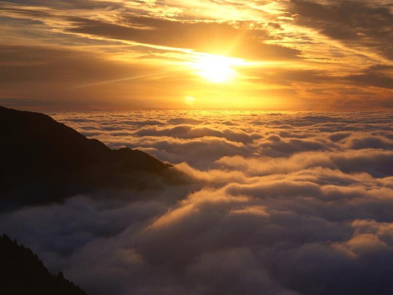 Sunrise over sea of clouds