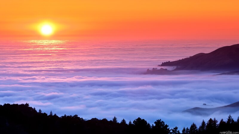 Sunrise over sea of clouds