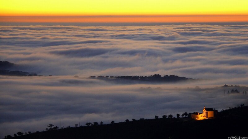 Sunrise over sea of clouds