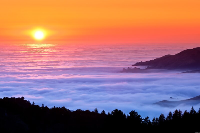 Sunrise over sea of clouds