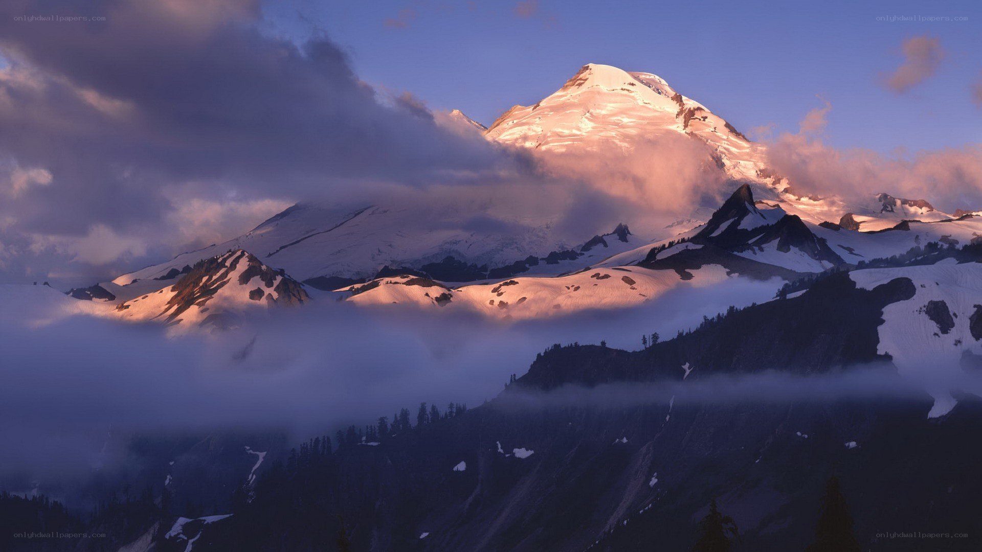 Sunrise over snow-capped mountain