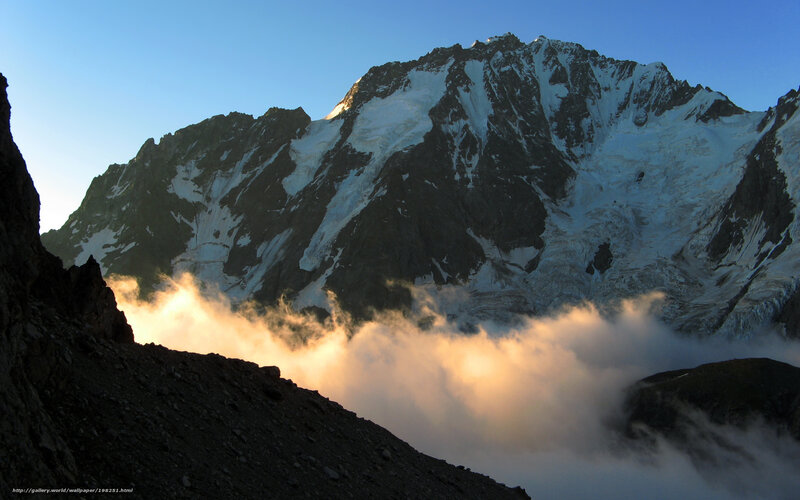 Sunrise over snow-capped mountain