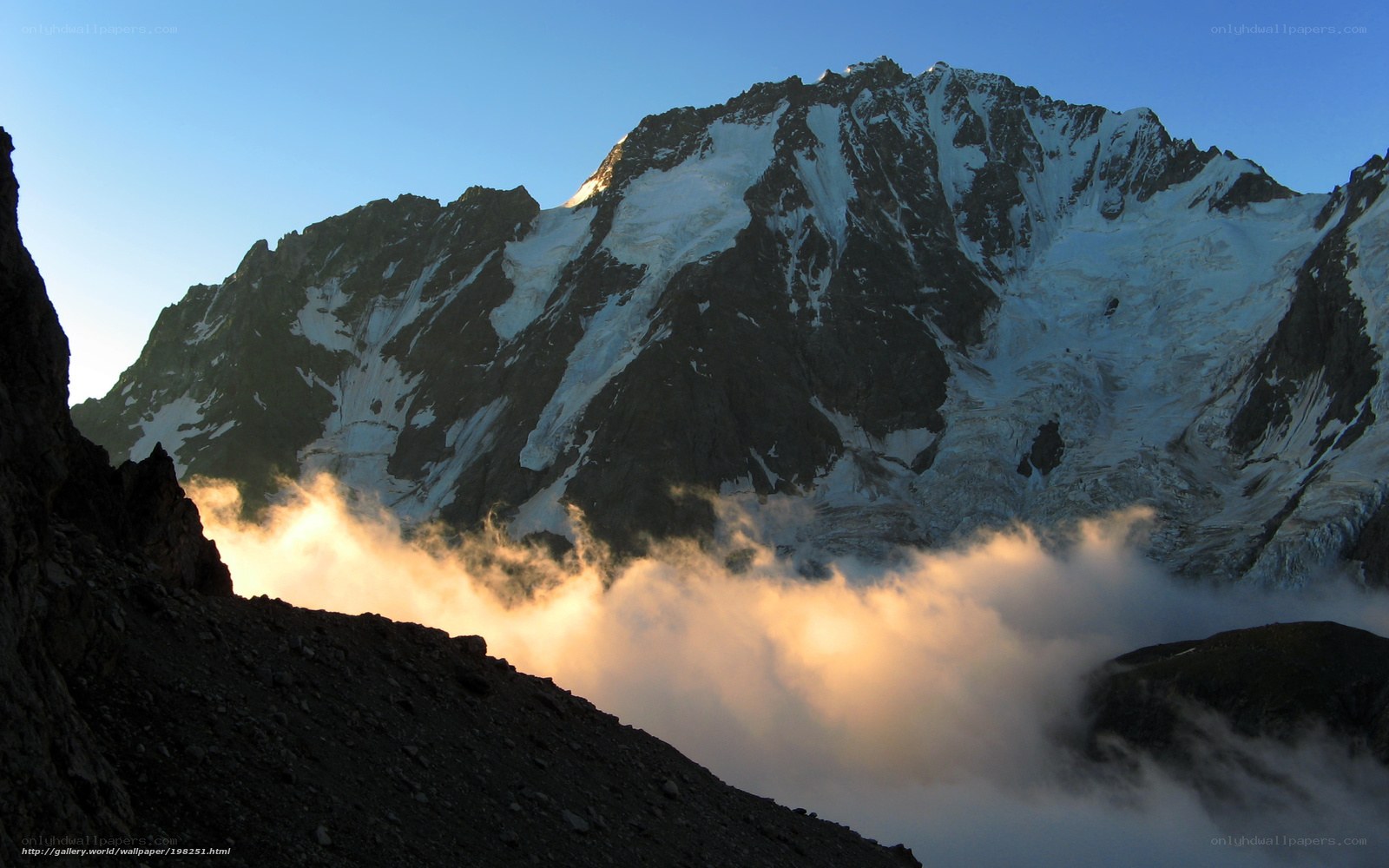 Sunrise over snow-capped mountain