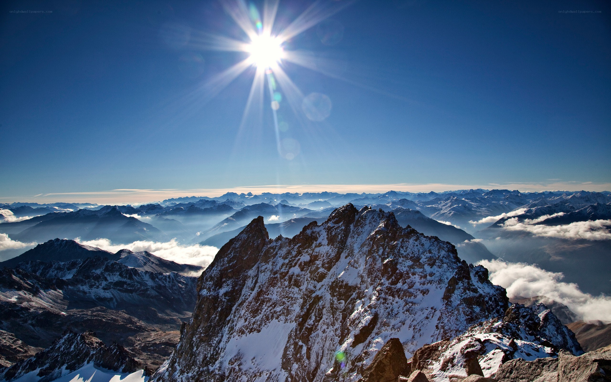 Sunrise over snow-capped mountains
