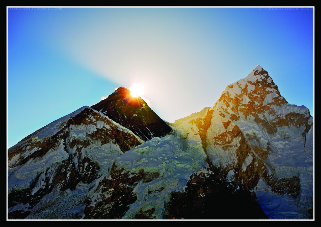 Sunrise over snow-capped mountains