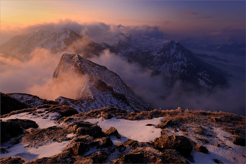 Sunrise over snow-capped mountains